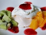 Pavlova With Sweetened Whipped Cream & Plum Sauce