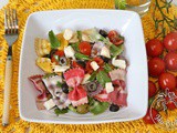 Ricetta Farfalle primavera con pomodorini, mozzarella rucola e olive