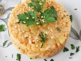 Ricetta Risotto con patate, Castelmagno Alpeggio dop Occelli e briciole d’oro alimentari