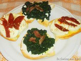 Bruschetta con spinaci e pomodori secchi