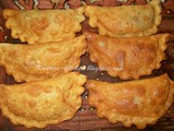 Chobey ki poori - coconut stuffed sweet empanadas