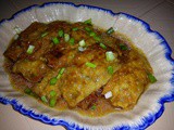 Braised beancurd skin rolls in oyster sauce