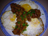 Fried eggs with minced meat