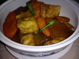 Stewed winter melon with tofu puffs