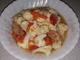 Stir fry cauliflower with tomatoes