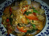 Thai stir fry tuna with basil leaves