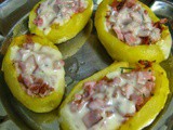 Barchette di patate al forno con prosciutto e formaggio