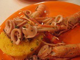 Polentine con calamaretti e scampi