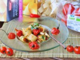 Calamarata con ciuffi di calamaro e pomodorini arrostiti