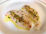 Carpaccio di scampi di Mazara del Vallo con granella di pistacchi siciliani