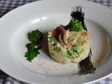 Cous cous integrale con cime di rapa e seppie