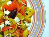 Peperoni grigliati con feta olive pinoli e menta