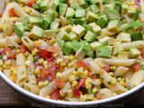 Corn pasta salad with tomato and avocado