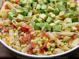 Corn pasta salad with tomato and avocado