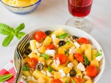 Pasta fredda con pollo verdure feta e melone