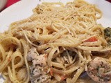 Tuscan Chicken Over Creamy Tomato Linguine