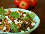 Pasta with Arugula, Goat Cheese and Sun Dried Tomato Pesto