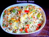 423: Navratan Pulao-Cooked rice and vegetables mildly flavored with spices
