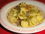 Orecchiette con salsiccia, piselli e pomodorino