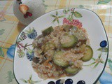 Risotto con zucchine, carciofi e pomodori