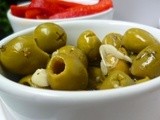 Marinated cracked green olives