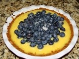 145.4…Double Lemon Curd Cheesecake Pie with Sugared Blueberries