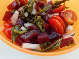 Salad with cherry tomatoes, beetroot, onion and capparis
