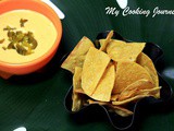 Baked Tortilla Chips with Homemade Nacho Cheese Sauce