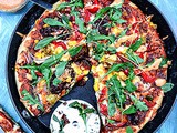 Pepper Corn Arugula Pizza with Sun-Dried Tomatoes and Mayonnaise Pepper Drizzle