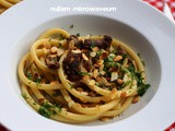 Bigoli pasta met ossenstaart en geroosterde amandelen