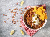 Hearty mexican bean stew with minced meat and corn
