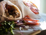 Greek Gyro in pita bread | Marinated pork loin with tzatziki sauce in Greek bread