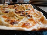 Artichoke heart, caramelized onion and brie tart