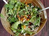 Arugula salad with roasted carrots, beets, pecans and shaved goat cheese