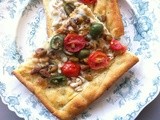 Castelvetrano pistachio and white bean pizza with a chickpea flour crust