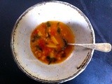 Chickpea and farro soup with spinach and tomatoes