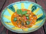 Chickpea stew with tomatoes, chard and castelvetrano olives