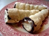 Chocolate-lined shortbread cones filled with almond pastry cream