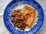 Collards and red beans with smoky masa harina pudding-bread