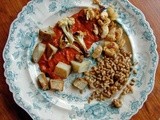 Roasted cauliflower, potatoes and butterbeans in spicy red pepper – olive sauce