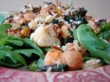 Roasted chickpeas and cauliflower with kale, raisins and almonds, and manchego cheese