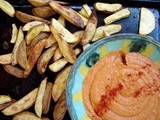 Roasted rosemary fries and spicy tomato hummus