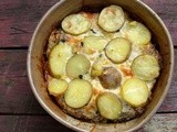 Thinly sliced potatoes baked with kale, artichoke hearts and pesto ricotta