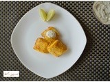Spiced Batter Baked Fish Topped with Dill Pickle Yogurt Raita