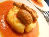 Polenta con sugo di spuntature e salsicce