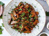 Stir fried eggplant and seitan with garlic and tomato