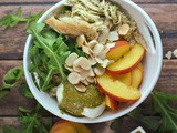 Peach, Burrata, and Arugula Quinoa Bowl with Chicken and Pesto Vinaigrette