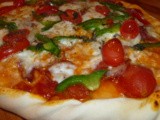 Pizza prosciutto en mozzarella