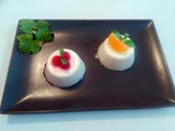 Delicatezze di Panna Cotta con Coulis Leggera di Lamponi e Mandarino