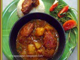 Chingri macher Dum (Prawns cooked in dum style)